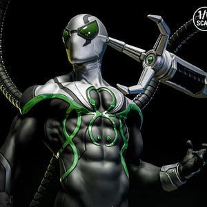 May include: A detailed action figure of a superhero in a black and silver suit with green accents. The figure has a metallic head with green lenses and mechanical arms. The figure is 1/6 scale.