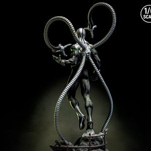 May include: A detailed statue of a superhero figure with four metallic tentacles extending from its back. The figure is primarily black with silver and green accents. The statue is labeled as 1/6 scale.