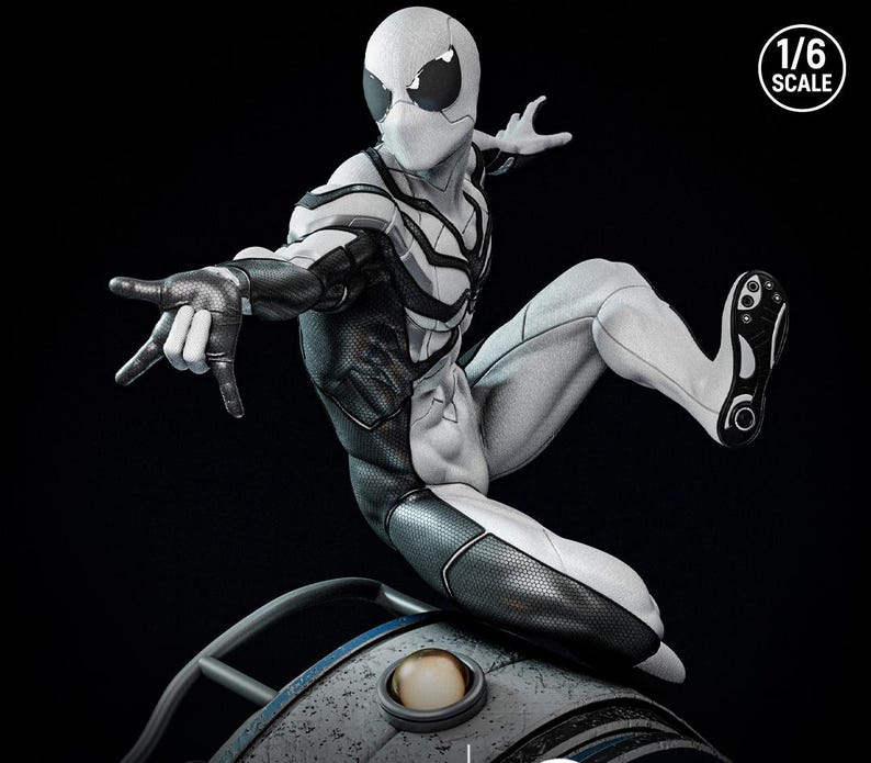 May include: A detailed, monochrome action figure of a superhero in a dynamic pose. The figure is predominantly white with black accents, including a mask, gloves, and sections of the suit. The figure is labeled as 1/6 scale.