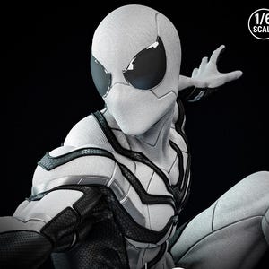 May include: A detailed, close-up of a white and black Spider-Man action figure. The figure has a textured white suit with black accents and large black eye coverings. The figure is posed against a black background, with a 1/6 scale label.