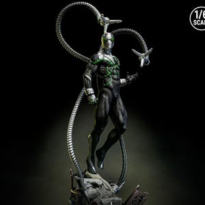 May include: A 1/6 scale statue of a superhero in a black and silver suit with green accents. The figure has four mechanical arms extending from its back. The statue is posed mid-air against a dark background.