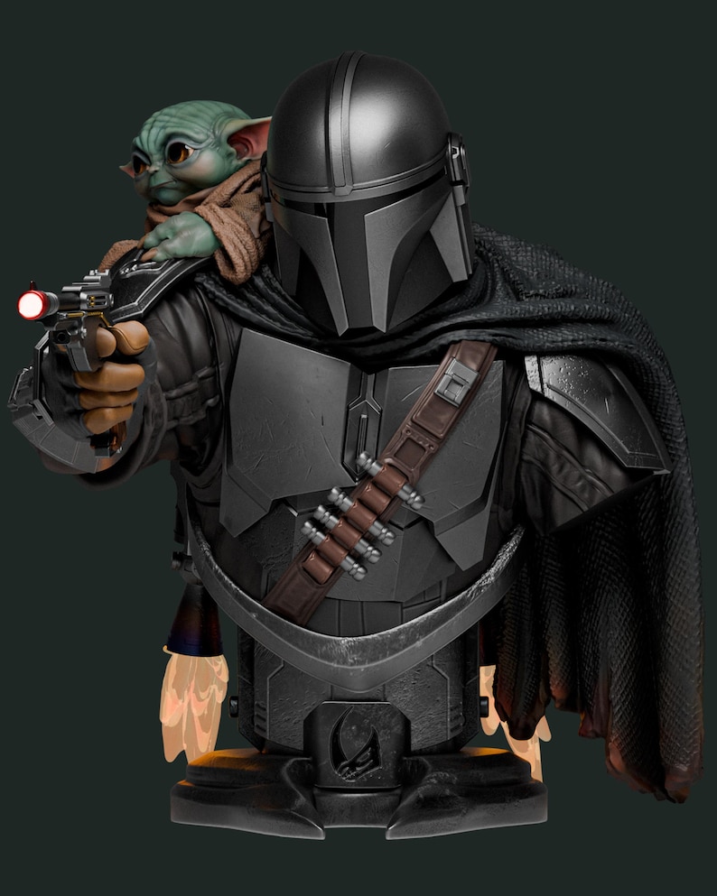 May include: A detailed bust of the Mandalorian, a character from the Star Wars series, with Grogu, also known as Baby Yoda, perched on his shoulder. The Mandalorian is clad in dark gray armor and a black cape, holding a blaster. Grogu is green with large ears.