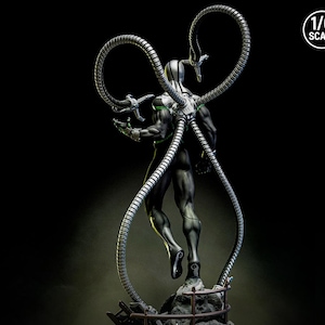 May include: A detailed statue of a superhero figure with four metallic tentacles extending from its back. The figure is primarily black with silver and green accents. The statue is labeled as 1/6 scale.