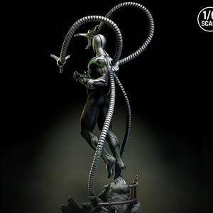 May include: A 1/6 scale statue of a character in a black and silver suit with four mechanical arms. The figure is posed mid-air, with the arms extending upwards. The statue has green accents and is set against a dark background.