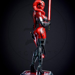 May include: A red and black figure of a female character holding a red lightsaber. The figure is on a black base with a red top. The character has red skin and black markings. She is wearing black boots and a black outfit.