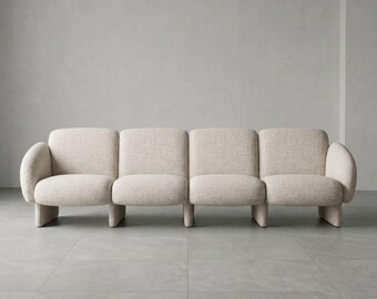 Ozzy Sofa – Sculptural Upholstered Lounge Sofa , Custom Fabric, Oak Legs
