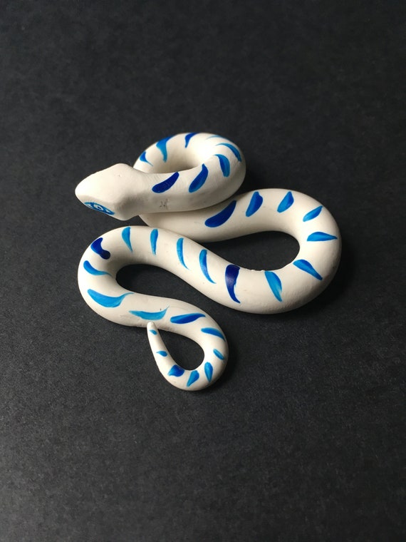 clay snake sculpture