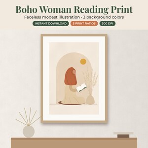 May include: A framed wall art print featuring a faceless figure in a rust-colored head covering and beige clothing reading a book. The illustration includes an arched doorway, a yellow sun, and a vase with dried grass in a neutral color palette.