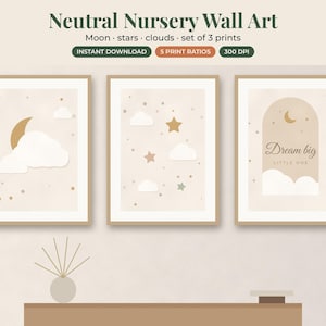 May include: A set of three wall art prints featuring a neutral color palette with illustrations of a crescent moon, stars, and clouds. The third print includes an archway graphic with the text Dream big LITTLE ONE in a script font.