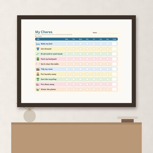 May include: A framed chore chart titled My Chores with a weekly grid featuring rows for tasks like make my bed, get dressed, and water the plants. Each row includes a colorful icon, a space for a name, and columns for days of the week with stars.
