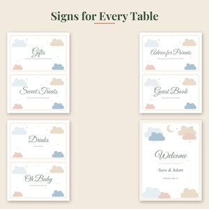 May include: A set of seven rectangular signs with a cloud and star theme in muted blue, pink, and beige. The signs feature the text: Signs for Every Table, Gifts, Sweet Treats, Drinks, Oh Baby, Advice for Parents, Guest Book, and Welcome Sara & Adam.