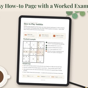 May include: A digital tablet displaying a Sudoku instructional page titled How to Play Sudoku. The screen shows rules, a worked example grid with numbers, and helpful tips. The layout includes text boxes explaining rows, columns, and 3x3 boxes.
