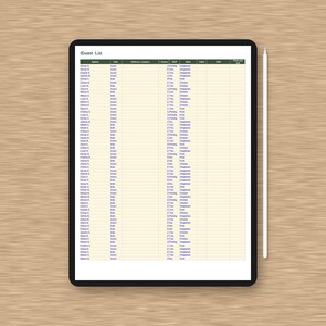 May include: A digital tablet displaying a wedding guest list spreadsheet with columns for name, side, contact, RSVP, meal, table, and thank you sent. The screen features a dark green header and a light cream background. A white stylus rests beside the tablet.