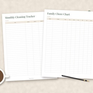 May include: Two white paper sheets featuring printed grids. The left sheet is titled Monthly Cleaning Tracker with columns for task and weeks. The right sheet is titled Family Chore Chart with columns for name, chore, and days of the week.