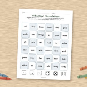 May include: A white educational worksheet titled Roll & Read Second Grade featuring a grid of light blue squares containing words like pull, does, these, and wash. Below the grid are six squares with dice dot patterns from one to six.