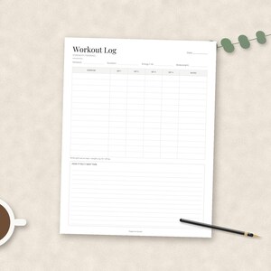 May include: A white workout log sheet with black text and grid lines. The header reads Workout Log, Strength Training, and Date. It includes columns for exercise, sets, and notes, with a lined section at the bottom for additional training notes.
