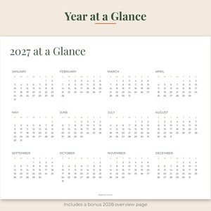 May include: A white 2027 calendar page with the text Year at a Glance at the top and 2027 at a Glance below it. The calendar displays all twelve months from January to December in a grid format with black text on a white background.