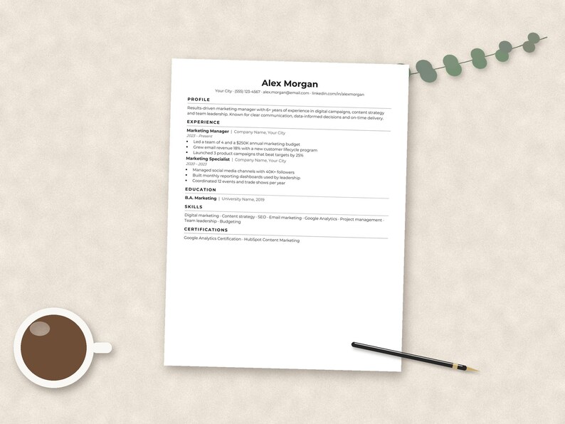 May include: A white resume document titled Alex Morgan with sections for profile, experience, education, skills, and certifications. The document is accompanied by a cup of dark coffee and a thin black pen, arranged on a neutral textured surface.