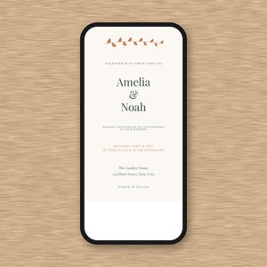 May include: A smartphone screen displaying a wedding invitation with a cream background, a small orange leaf graphic at the top, and black text reading Amelia & Noah, together with their families, request the pleasure of your company at their wedding.