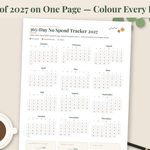 May include: A white 365-Day No Spend Tracker 2027 calendar page featuring twelve monthly grids with numbered days. The header reads All of 2027 on One Page &mdash; Colour Every Day. It includes a color-coded key for tracking daily spending habits.