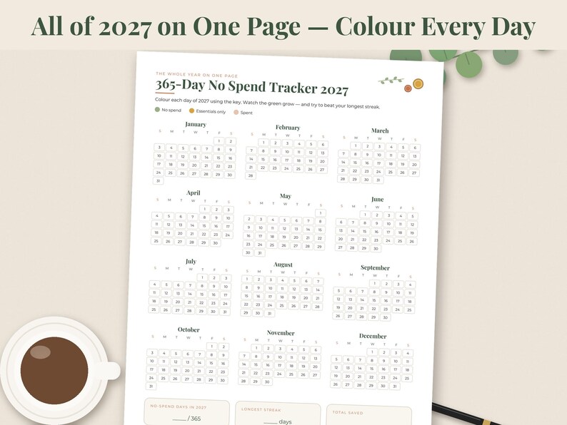 May include: A white 365-Day No Spend Tracker 2027 calendar page featuring twelve monthly grids with numbered days. The header reads All of 2027 on One Page &mdash; Colour Every Day. It includes a color-coded key for tracking daily spending habits.