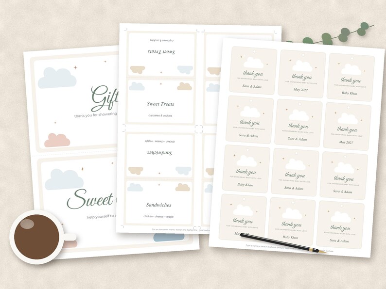 May include: Three sheets of printable paper featuring cloud-themed designs. One sheet displays gift and sweet treat signs, another lists food items like sandwiches, and the third contains twelve square thank you tags with cloud graphics.