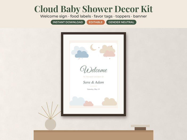 May include: A framed welcome sign for a baby shower featuring the text Cloud Baby Shower Decor Kit, Welcome, to the baby shower of Sara & Adam, Saturday, May 15. The design includes illustrations of blue, pink, and beige clouds, a moon, and stars.