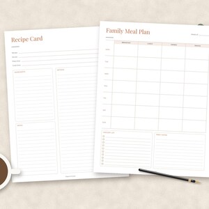 May include: Two white paper sheets featuring minimalist layouts. One sheet is titled Recipe Card with sections for ingredients, method, and notes. The other is titled Family Meal Plan with a weekly grid for breakfast, lunch, dinner, and snacks.