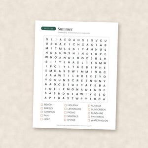 May include: A white paper sheet featuring a Summer-themed word search puzzle. The grid contains black capital letters, with a list of words to find below, including Beach, Breezy, Camping, Fan, Heat, Holiday, Lemonade, Picnic, Sandals, Shade, Sunhat, Sunscreen, Sunshine, Swimming, and Watermelon.