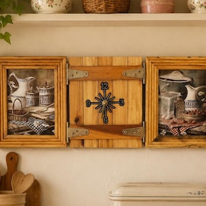 May include: A wall-mounted clock featuring a central wooden panel with a black metal star-shaped dial and numbers 3, 6, 9, and 12, flanked by two rectangular wooden frames containing kitchen-themed prints of pitchers, jars, and checkered cloths.