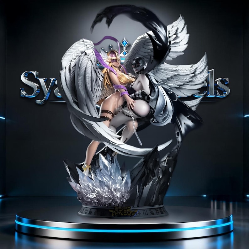 May include: A detailed statue of two figures with large wings. One figure has blonde hair and wears a purple crown and blindfold. The other figure is in black and white. The statue is on a round platform with a blue light.