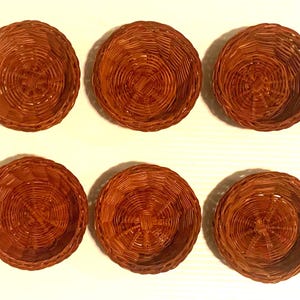 6 Round Wicker Baskets. Stackable 3 Inches by 2 Inches. Not eligible for Media Mail.