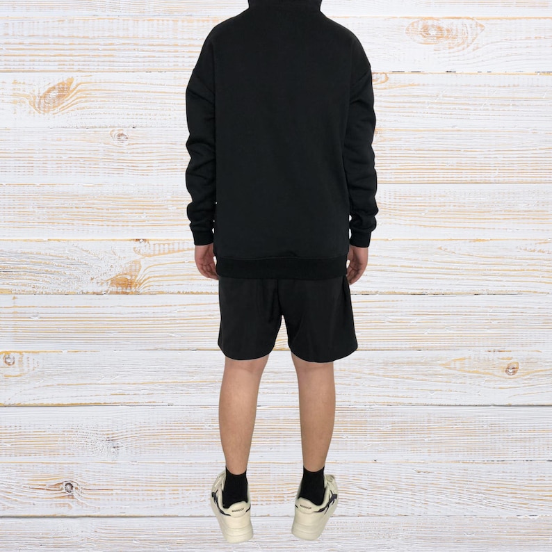Unisex oversized AMIRI graphic hoodie in black and white streetwear style