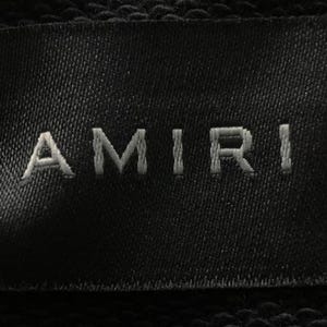 Unisex AMIRI-style hoodies in black and white with bold front graphic and stripe design, pullover streetwear sweatshirts with hood and kangaroo pocket.