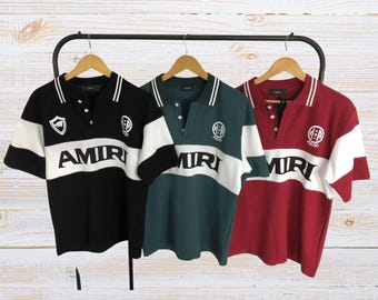 Polo unisex de rugby estilo Amiri con bloques de color, corte oversize.