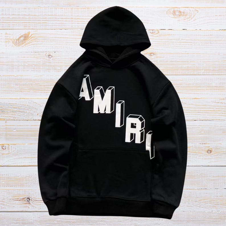 Unisex oversized AMIRI graphic hoodie in black and white streetwear style