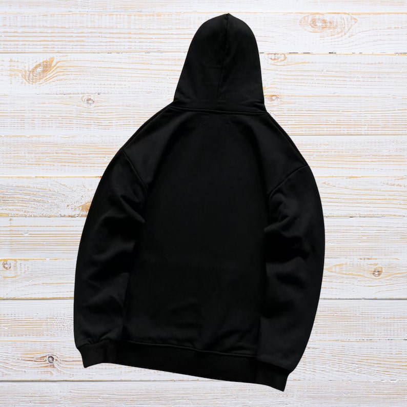 Unisex oversized AMIRI graphic hoodie in black and white streetwear style