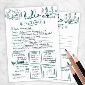 May include: A white stationery sheet with dark teal line art featuring a camping theme, including a tent, mountains, and a camper. The text reads "hello FROM CAMP" and includes fill-in-the-blank lines for a letter, plus boxes for activities, friends, and food.