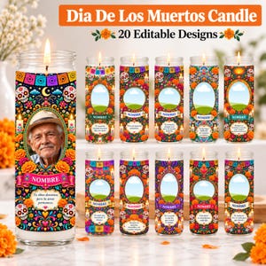May include: A collection of eleven cylindrical glass candles featuring Dia De Los Muertos designs with colorful sugar skulls, marigold flowers, and decorative banners. Each candle includes a central oval frame for a photo and text.