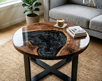 Mesa de centro redonda de resina negra, diseño River de madera maciza de nogal