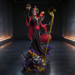 May include: A detailed figurine of Jafar from Disney's Aladdin. Jafar is depicted in his signature black and red robes, holding a golden staff with a cobra head. A small red parrot sits on his shoulder. The base features a stone lion and gold coins.