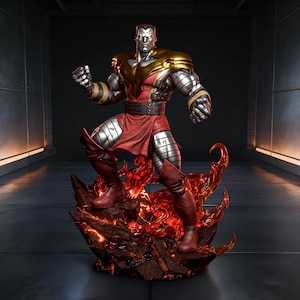 May include: A detailed statue of Colossus, a Marvel Comics character, stands on a fiery base. The figure is primarily silver with gold accents on the shoulders and red clothing. The statue is posed with a clenched fist, showcasing the character's strength.