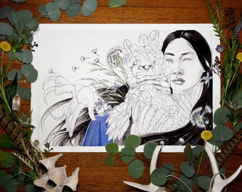 May include: A black and white line drawing of a woman with long black hair and a bird with large wings. The woman is looking at the viewer and the bird is looking away. The drawing is on a white background and is surrounded by green leaves and flowers.