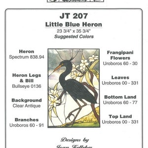 May include: Stained glass pattern for a Little Blue Heron, measuring 23 3/4 inches by 35 3/4 inches. The pattern includes suggested colors for the heron, flowers, leaves, and background.