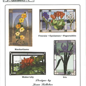May include: Four stained glass flower panel designs. The panels feature a water lily, iris, nasturtiums, and freesia, cyclamen, and paperwhite flowers. The panels are labeled with the flower names and the title "JT 211 (4) FLOWER PANELS".