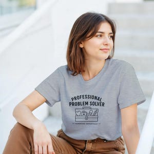 Professional Problem Solver Heavyweight Cotton T-Shirt | Teacher Gift | Funny Family Shirt | Unisex Graphic Tee | Every Family Has A Story