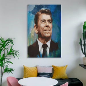 May include: A vertical wall art print featuring a portrait of Ronald Reagan. The subject is depicted in a dark suit and tie against a textured, expressive background of deep blue and teal brushstrokes, rendered in a painterly, oil-style aesthetic.