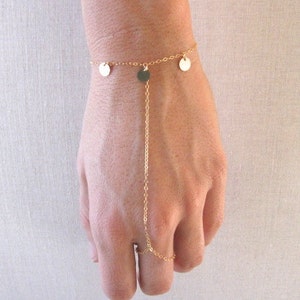 slave bracelet - hand chain // delicate 14k gold filled chain and sequin discs finger ring bracelet