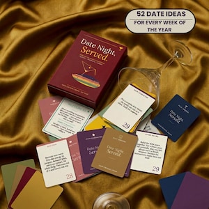 May include: A maroon box set titled "Date Night, Served." with a deck of cards scattered around a wine glass. The cards have various colors and text, including "52 Date Ideas For Every Week of The Year."