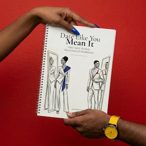 May include: A spiral-bound workbook titled "Date Like You Mean It" with illustrations of people in formal wear. The cover features the text "FIRST DATE TO REAL RELATIONSHIP WORKBOOK". The background is a solid red.
